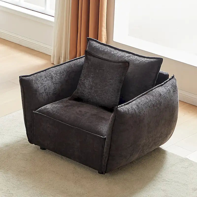 Fauteuil d'appoint en chenille noire avec coussins décoratifs, assise large et foncée