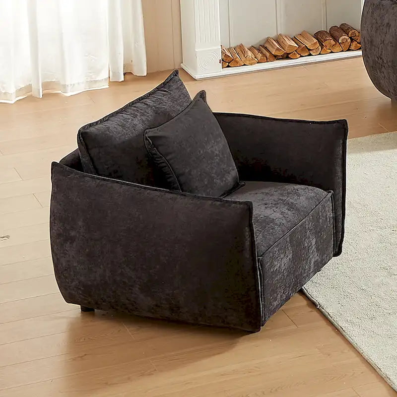Fauteuil d'appoint en chenille noire avec coussins décoratifs, assise large et foncée