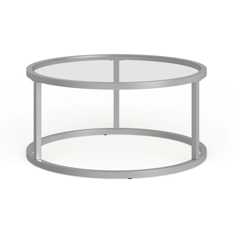 Table basse ronde avec plateau en verre trempé et cadre en acier finition laiton
