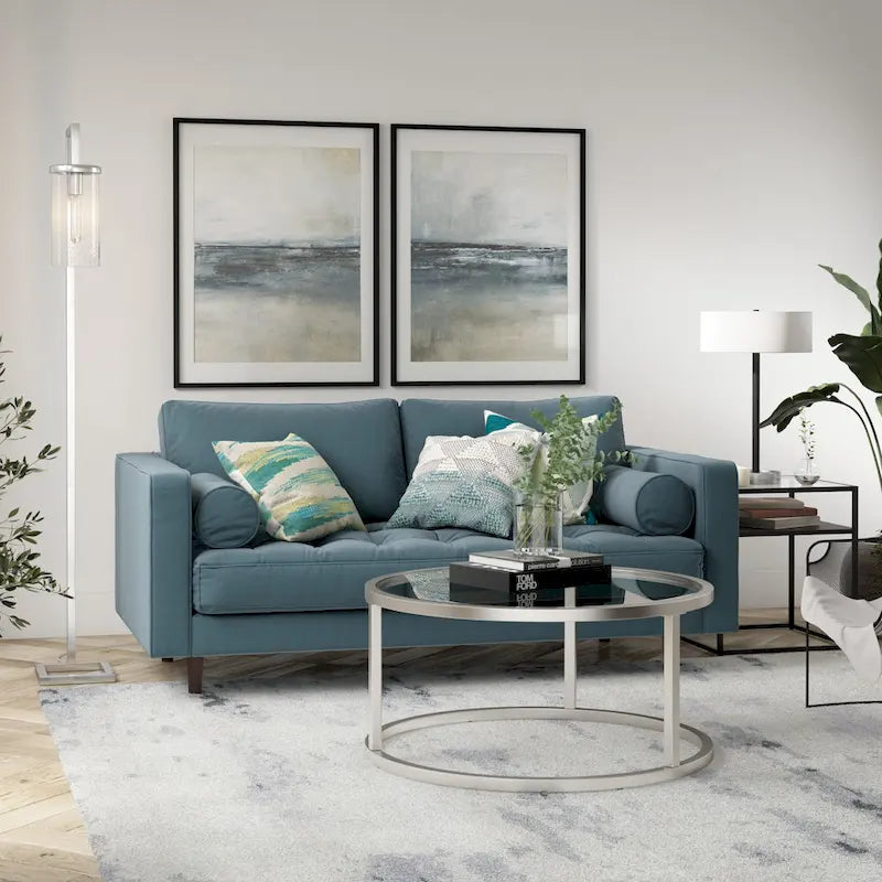 Table basse ronde avec plateau en verre trempé et cadre en acier finition laiton