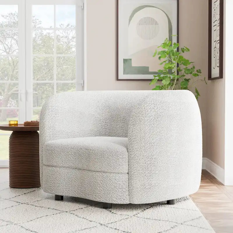 Fauteuil d'appoint moderne en bouclette avec accoudoirs incurvés, assise rénale et pieds ronds en bois
