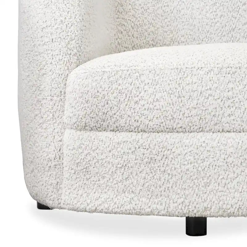 Fauteuil d'appoint moderne en bouclette avec accoudoirs incurvés, assise rénale et pieds ronds en bois