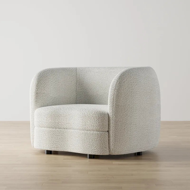 Fauteuil d'appoint moderne en bouclette avec accoudoirs incurvés, assise rénale et pieds ronds en bois