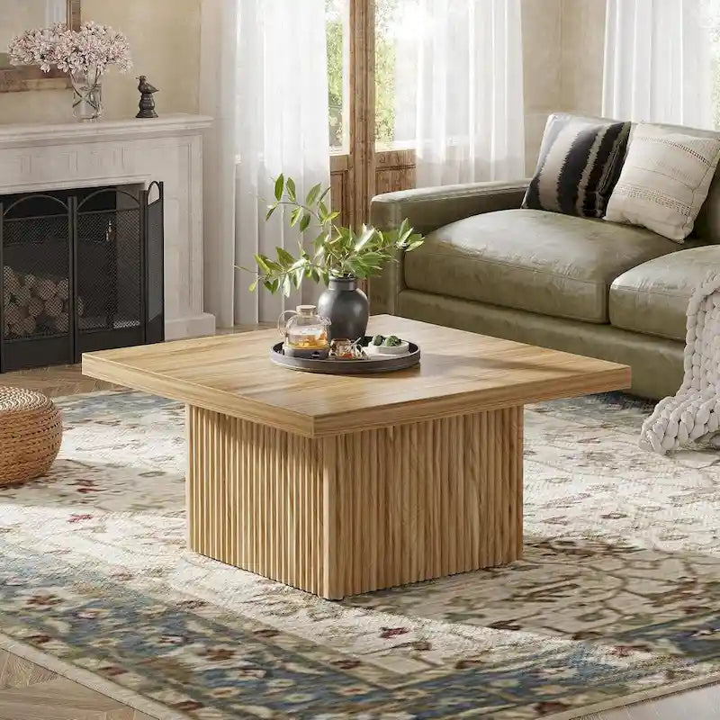 Table basse carrée en bois marron avec base cannelée pour salon