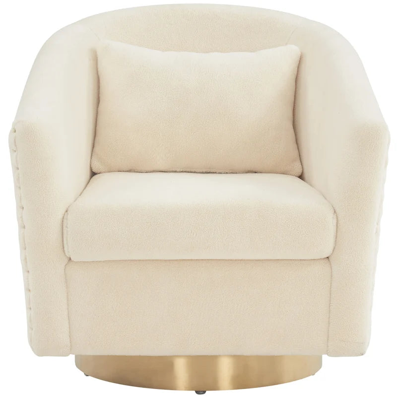Fauteuil pivotant en velours bleu marine matelassé losanges avec garniture cloutée