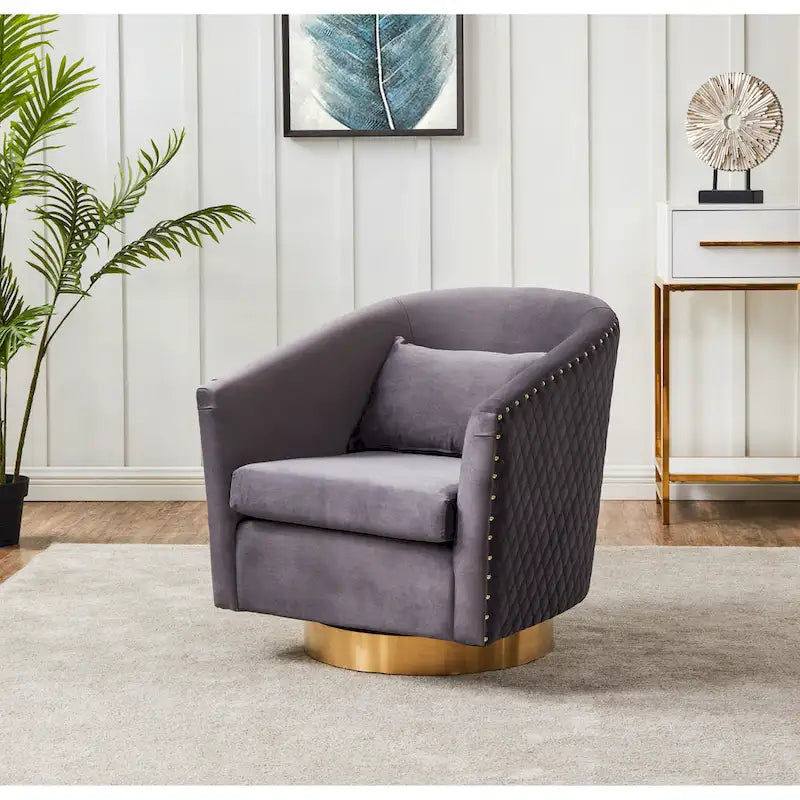 Fauteuil pivotant en velours bleu marine matelassé losanges avec garniture cloutée