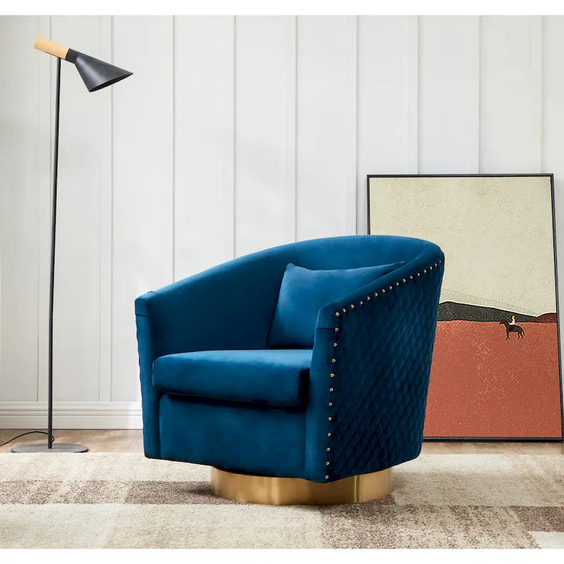 Fauteuil pivotant en velours bleu marine matelassé losanges avec garniture cloutée