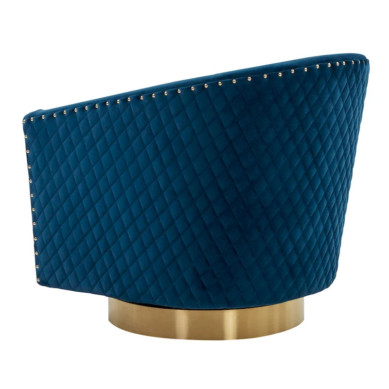 Fauteuil pivotant en velours bleu marine matelassé losanges avec garniture cloutée
