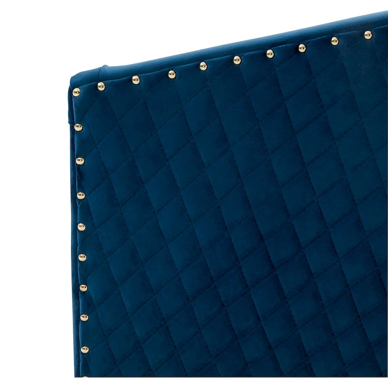 Fauteuil pivotant en velours bleu marine matelassé losanges avec garniture cloutée