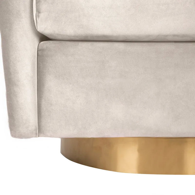 Fauteuil pivotant en velours bleu marine matelassé losanges avec garniture cloutée